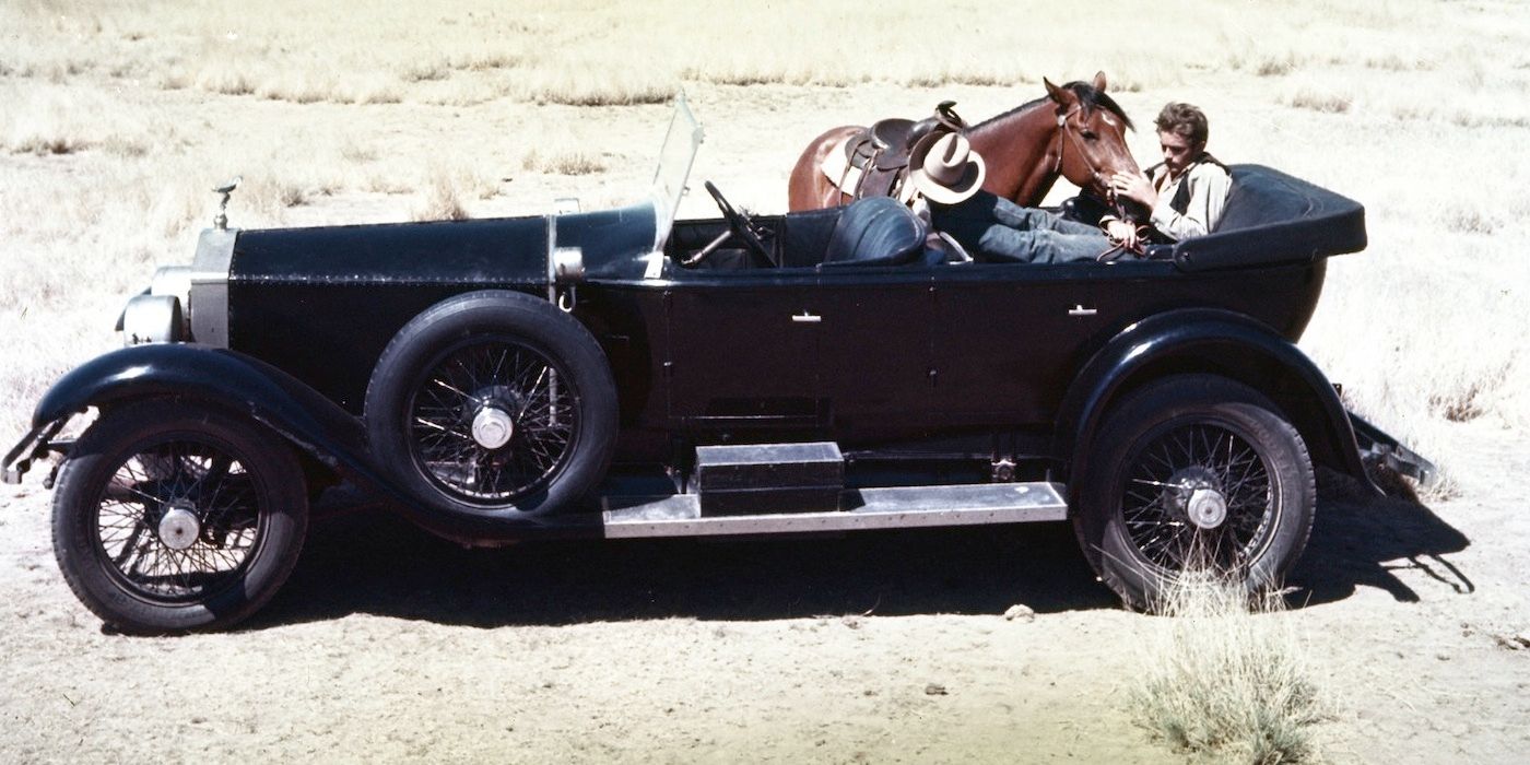 James Dean in a black car in Giant