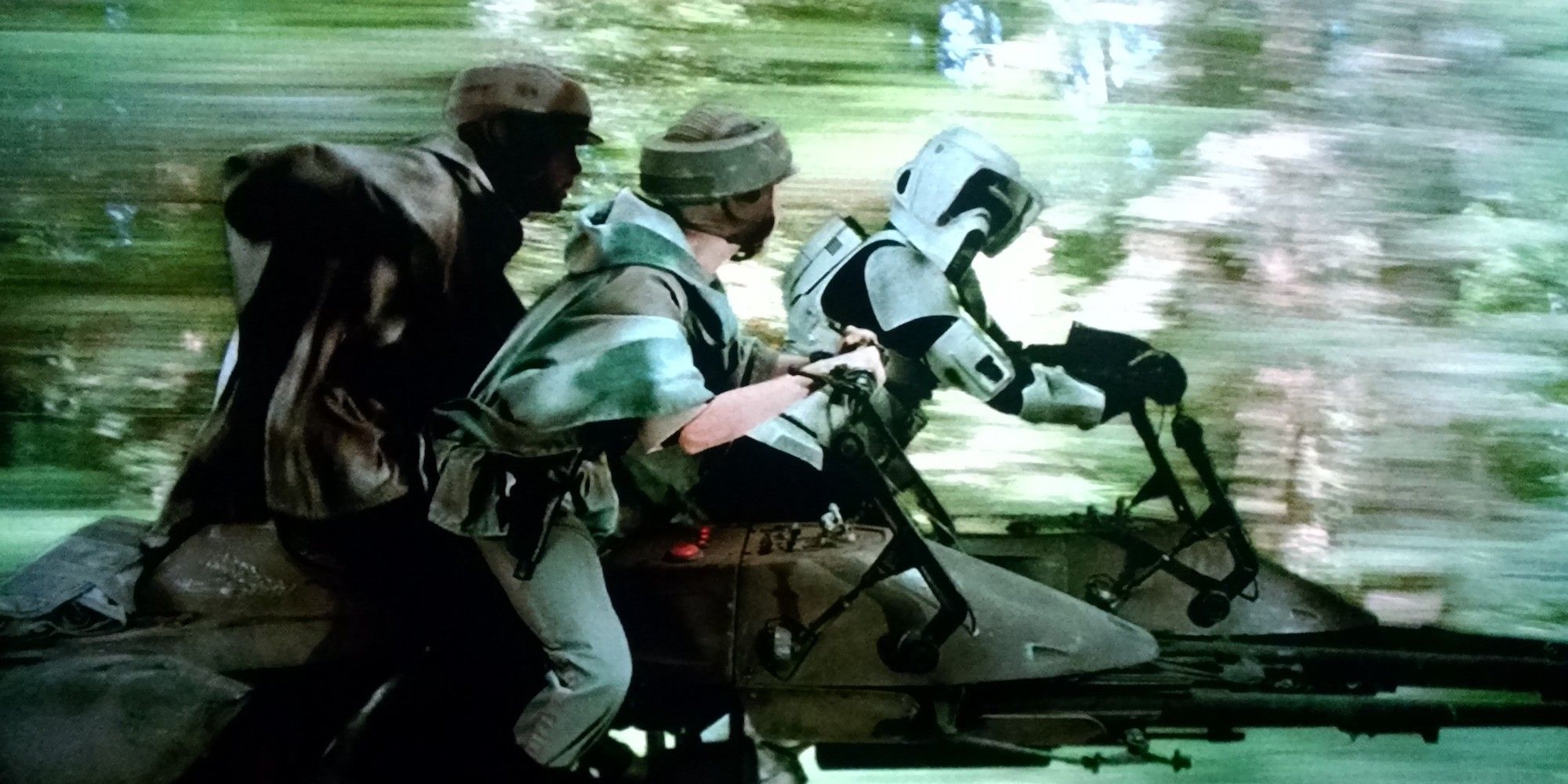 Luke Leia and a Stormtrooper on speeders in Star Wars Return of the Jedi