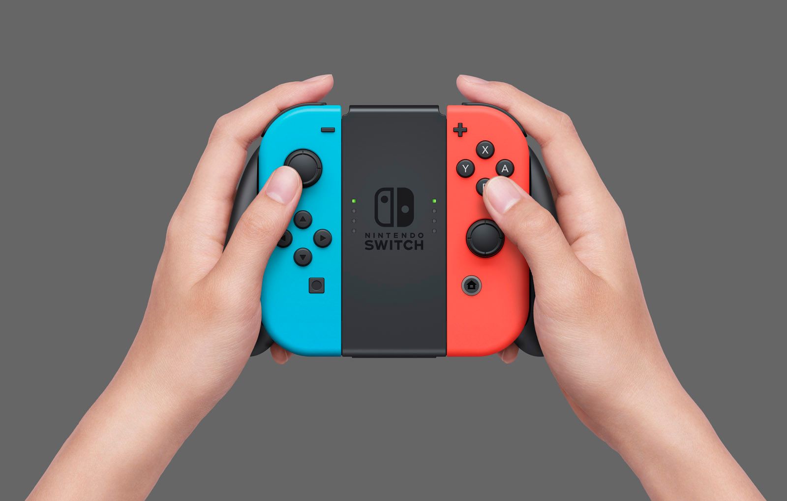 Nintendo Switch hardware - red and blue Joy-Cons in Grip