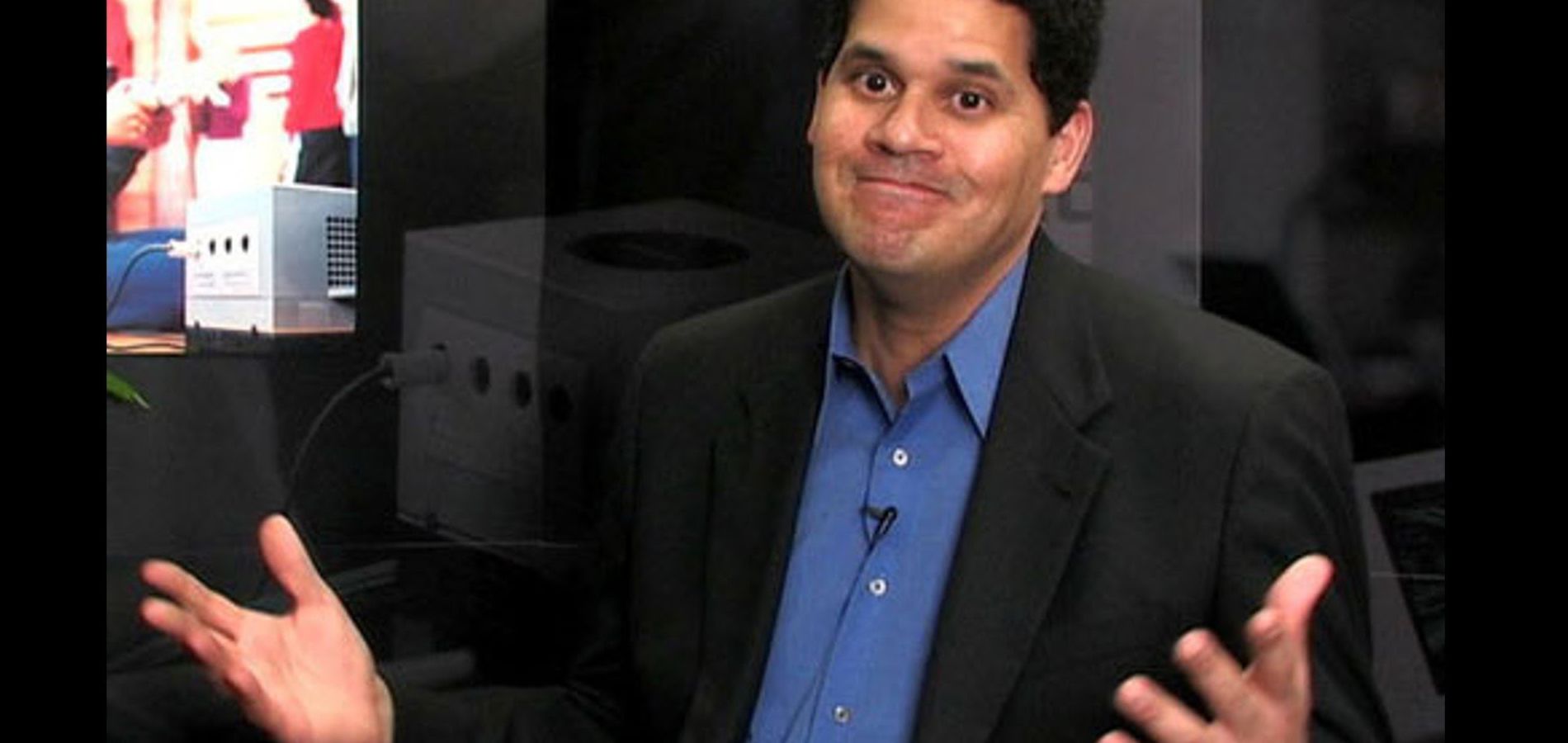 Reggie Nintendo Shrugging