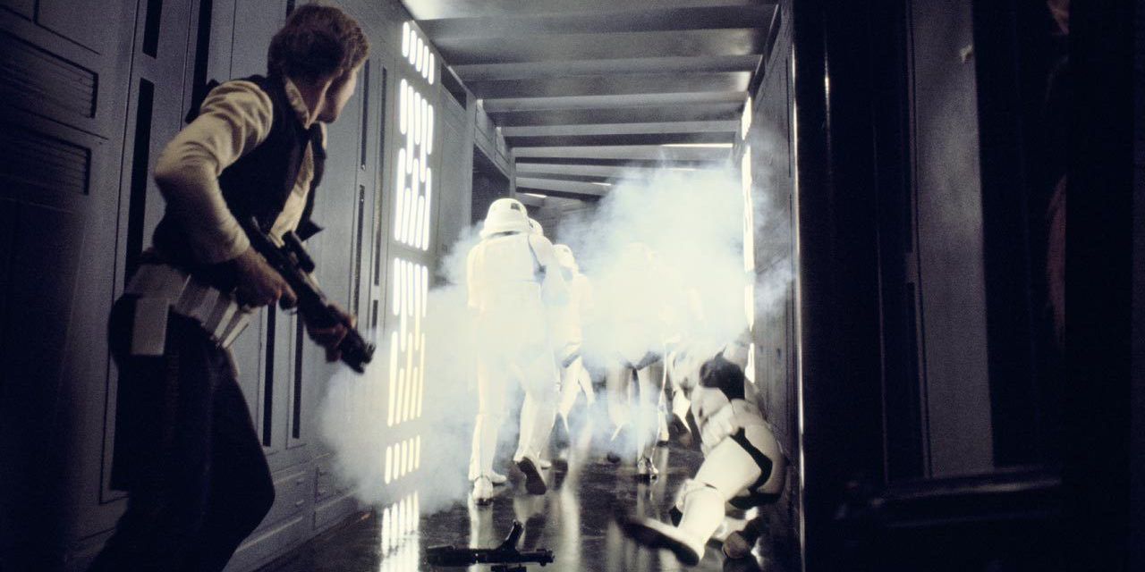 Stormtroopers run away from Han Solo in Star Wars A New Hope