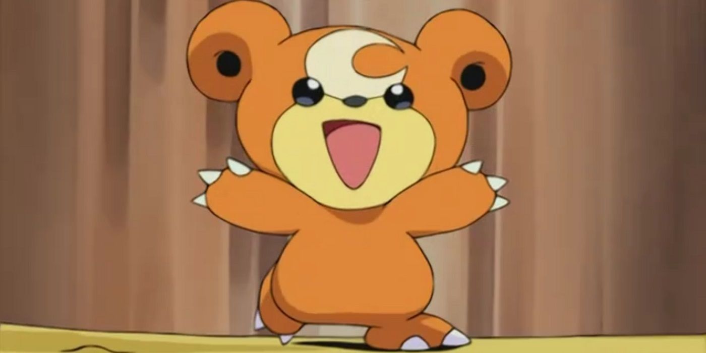 A Teddiursa smiles and spreads its arms as it runs