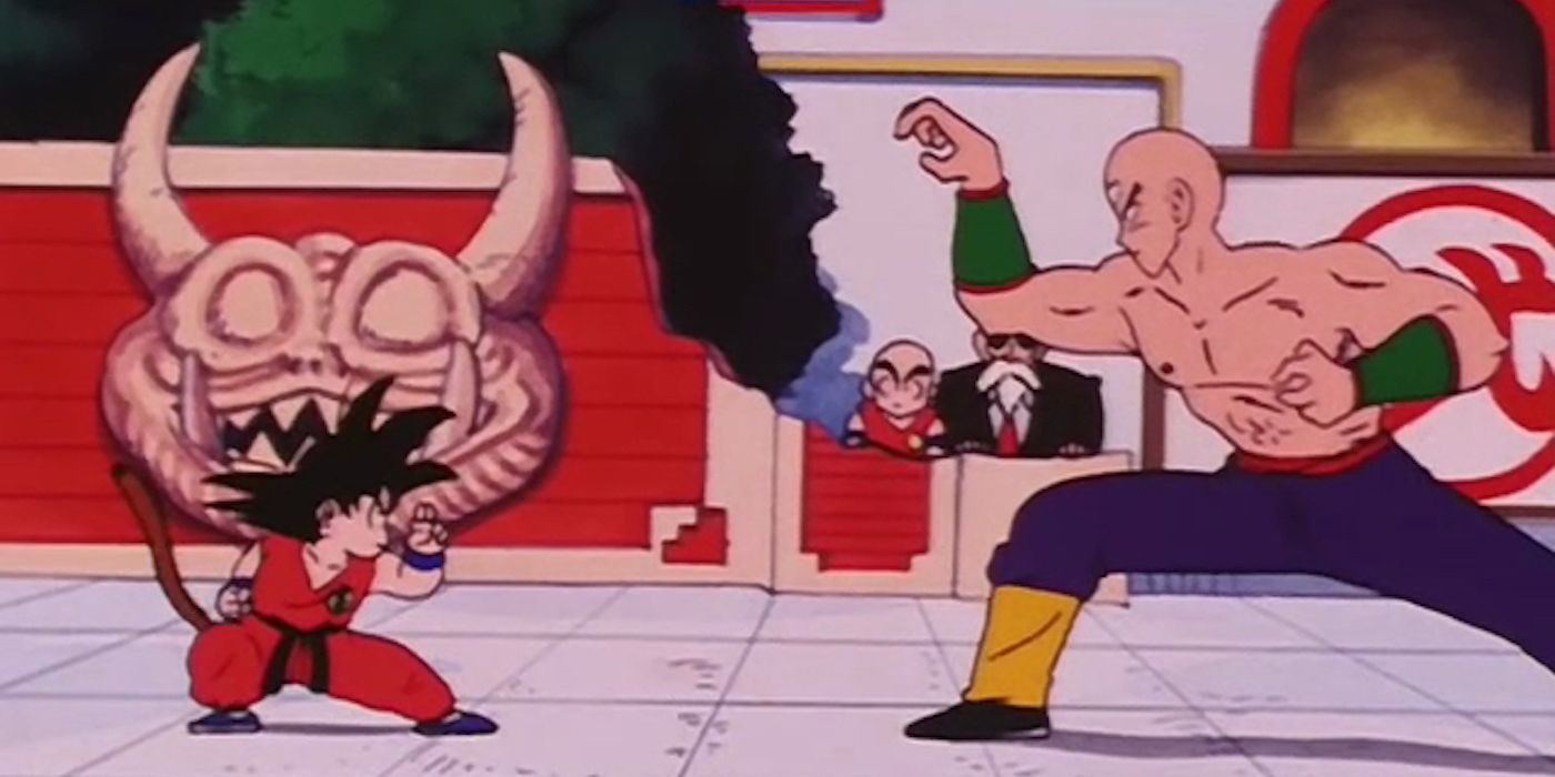 Tien ready to strike a Kid Goku who is in a fighting stance as Krillin and Roshi watch.