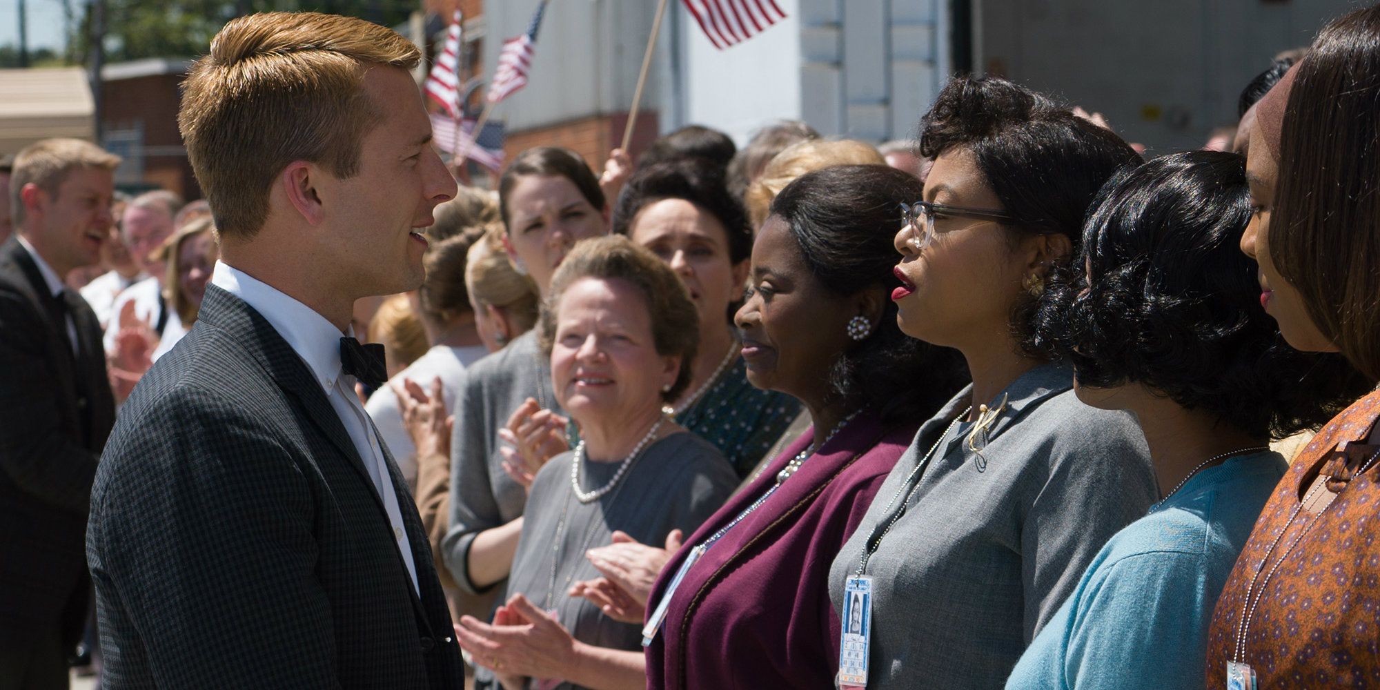 Glen Powell as John Glenn meets the women of Hidden Figures