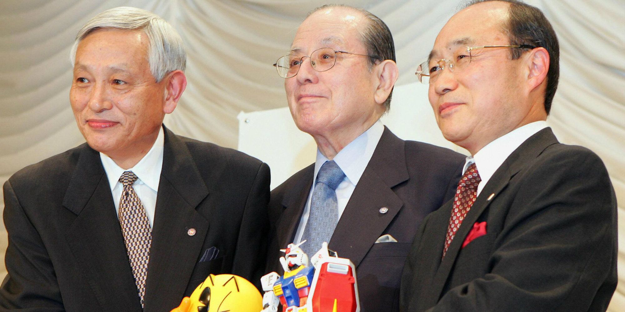 Masaya Nakamura (center), 'Father of Pac-Man'