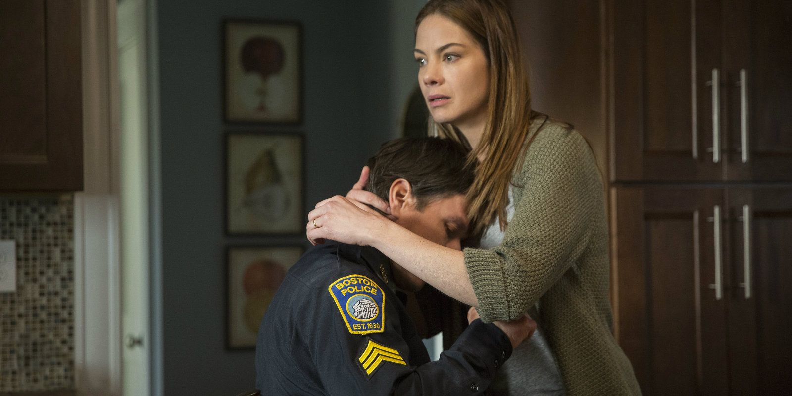 Patriots Day - Michelle Monaghan hugging a Boston PD officer