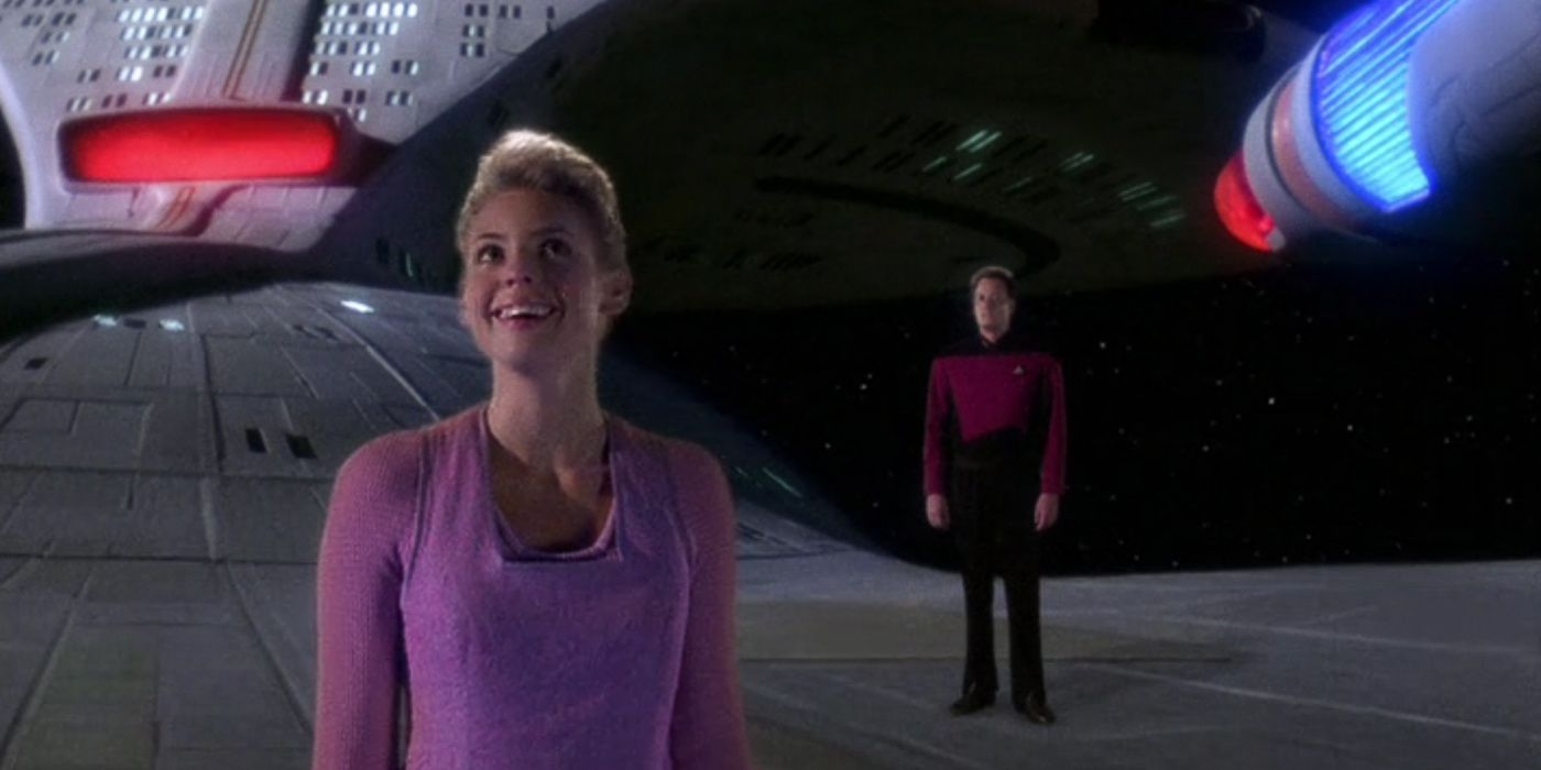 Q and Amanda walk on the hull of the Enterprise in Star Trek TNG