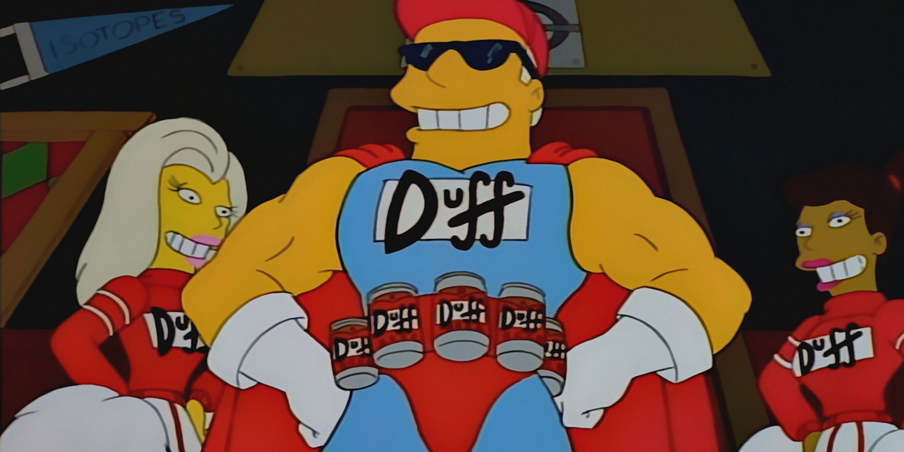Duffman smiling with his hands on his waist and two girls behind him in The Simpsons