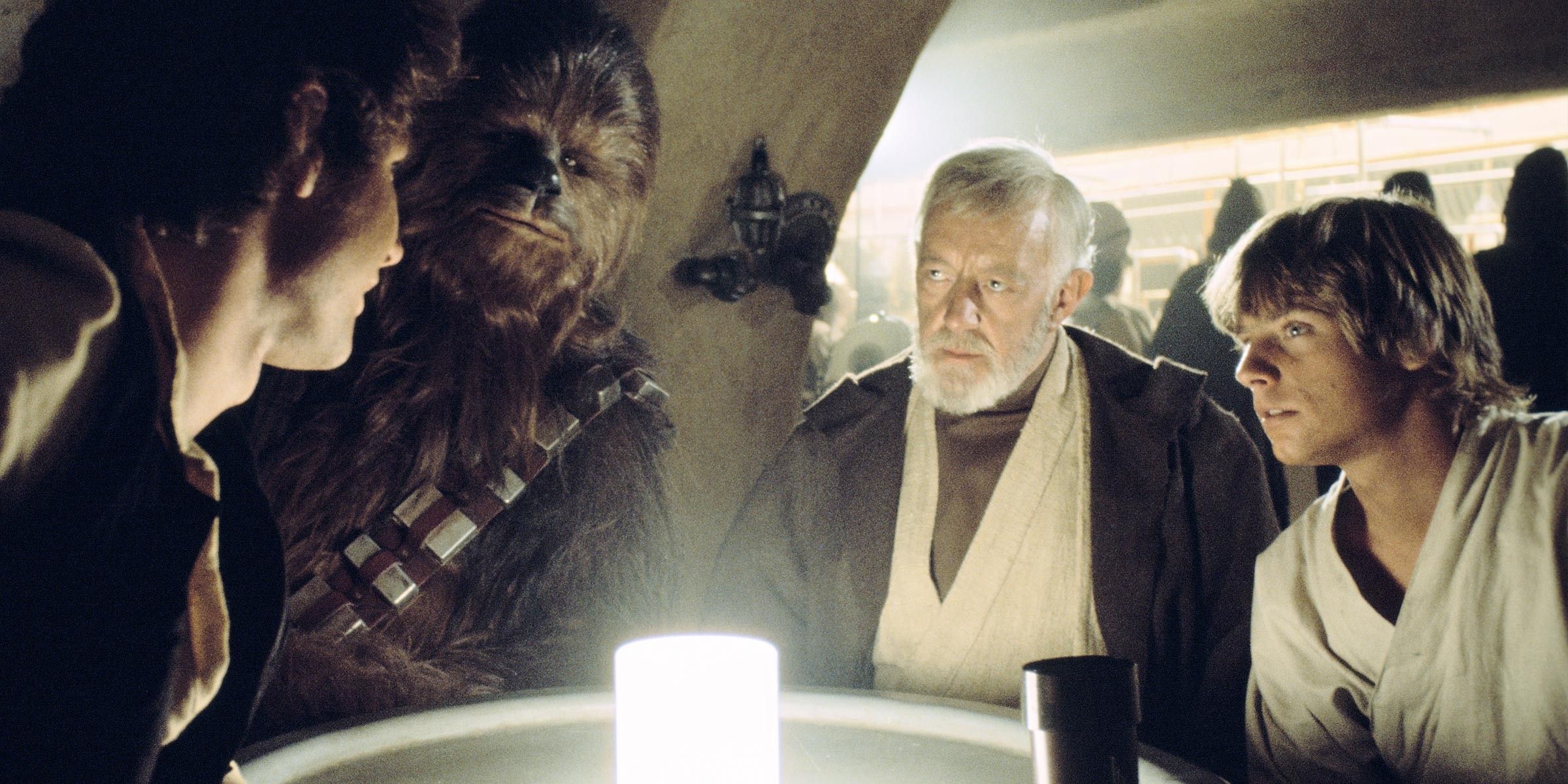 Luke and Obi-Wan meet Han and Chewey in Star Wars
