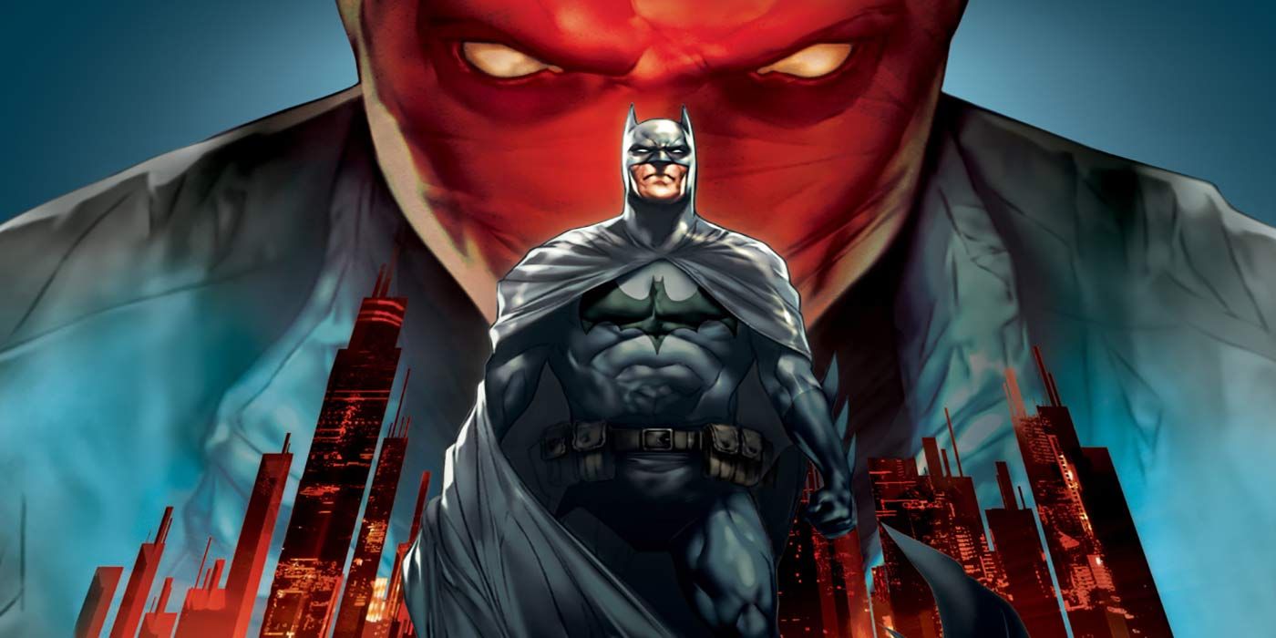 Batman in the foreground with Jason as the Red Hood looming in the background above Gotham.