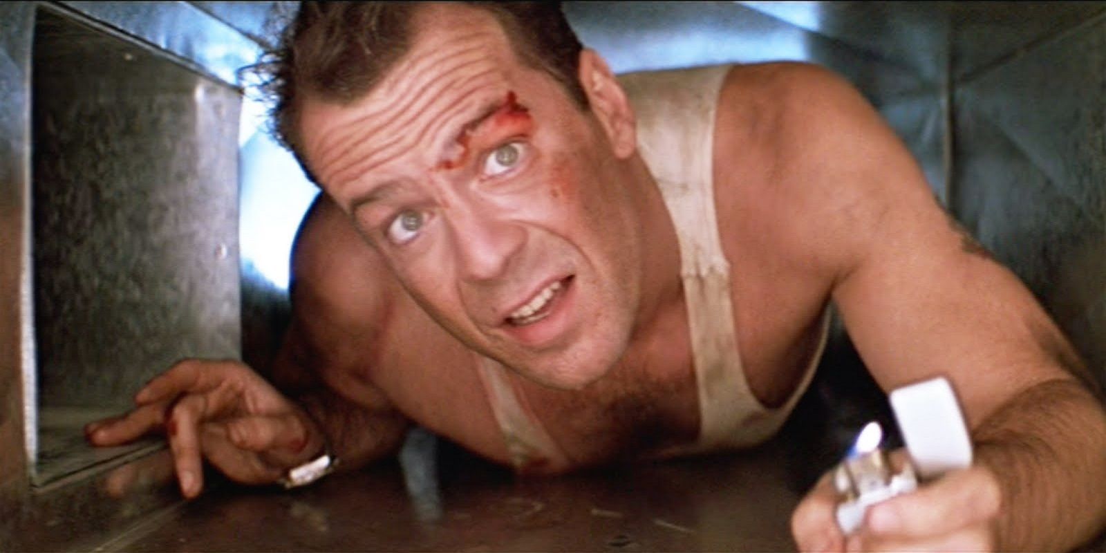 John McClane crawling through a vent in Die Hard
