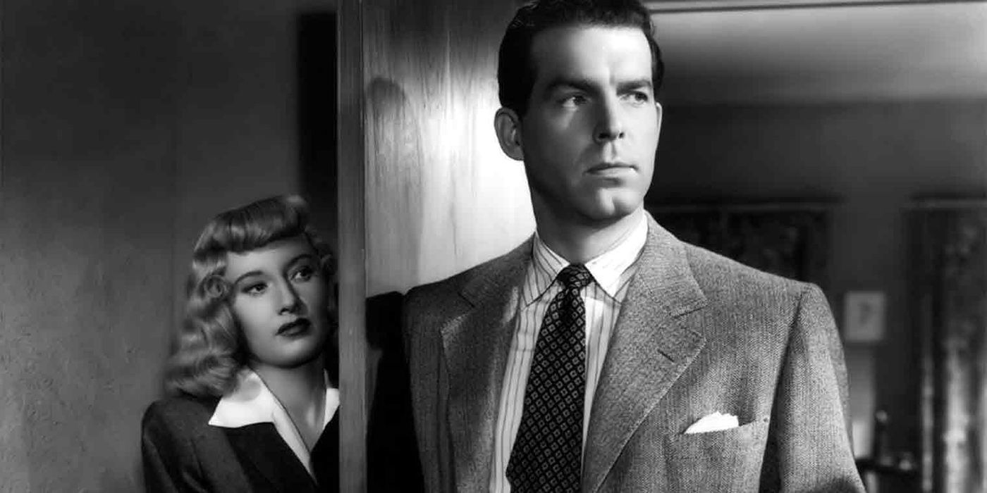 Two characters look sternly in Double Indemnity.