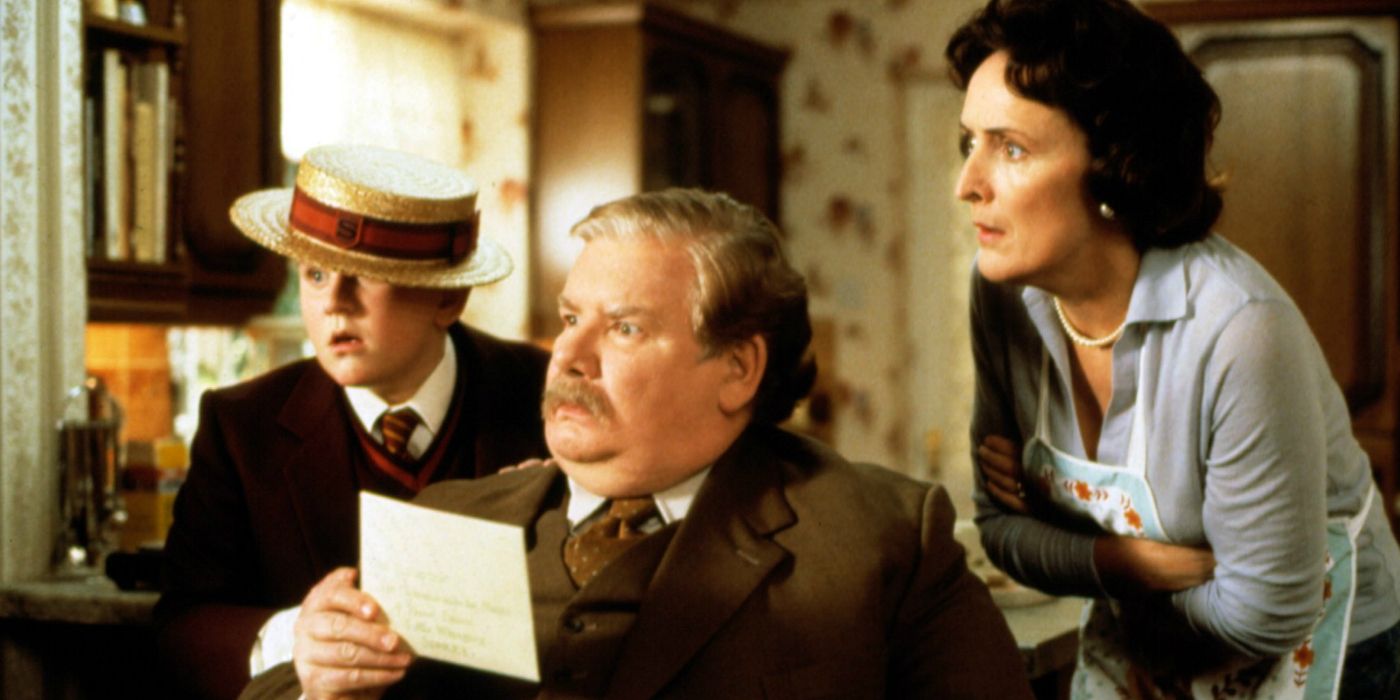 Dudley Vernon and Petunia Dursley stare at Harry in Harry Potter and the Sorcerer's Stone