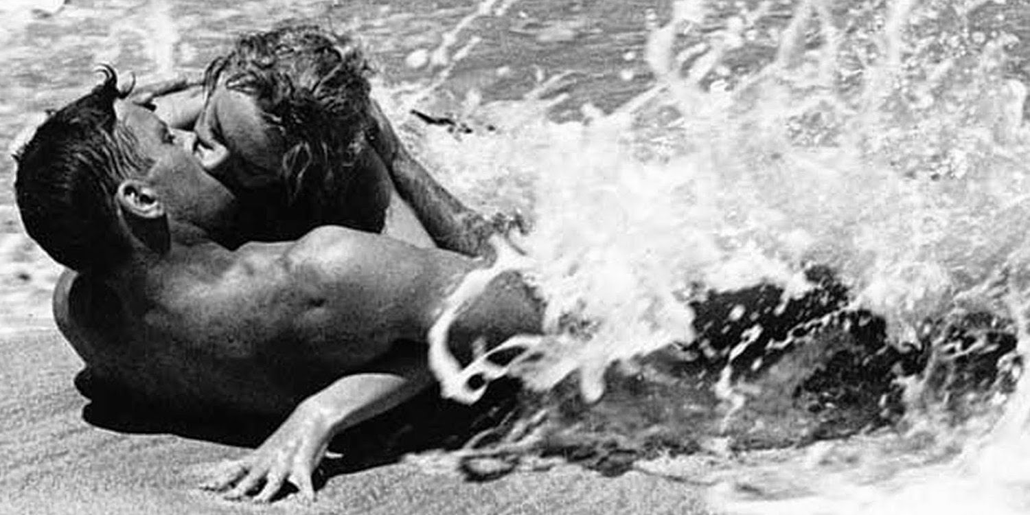 Burt Lancaster and Deborah Kerr kiss on the beach in From Here to Eternity