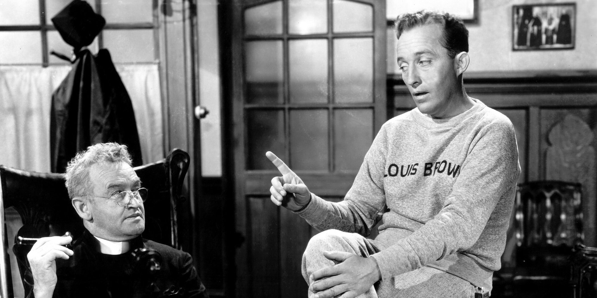 A black and white image of Chuck O'Malley (Bing Crosby) pointing his finger in Going My Way (1944).