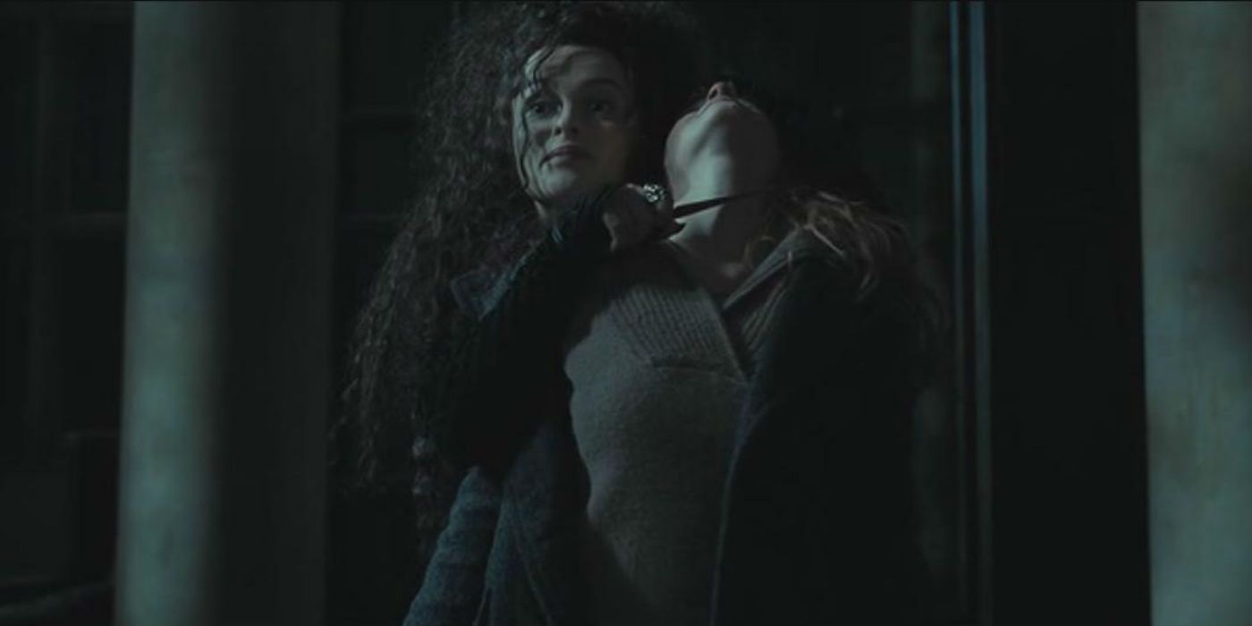 Helena Bonham Carter as Bellatrix Lestrange Holds Her Wand to Hermiones Throat
