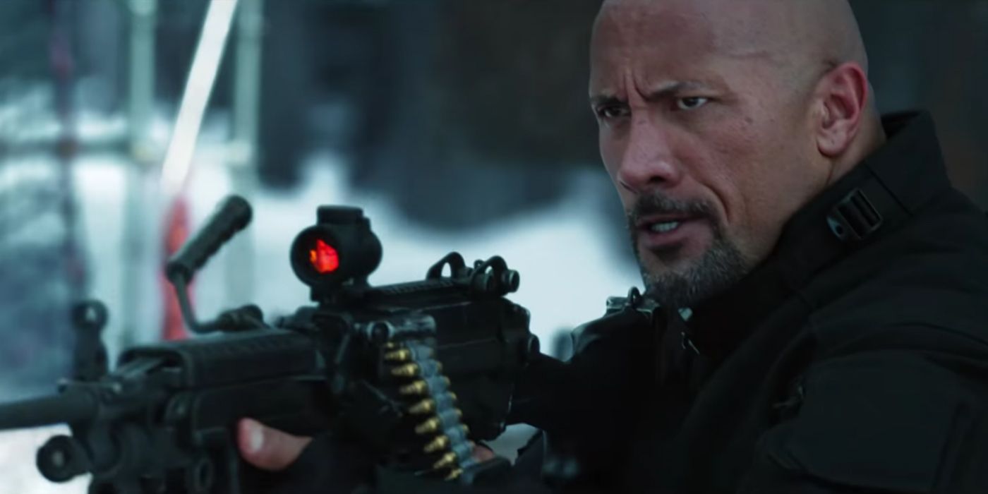 Hobbs (Dwayne 'The Rock' Johnson) with gun - The Fate of the Furious
