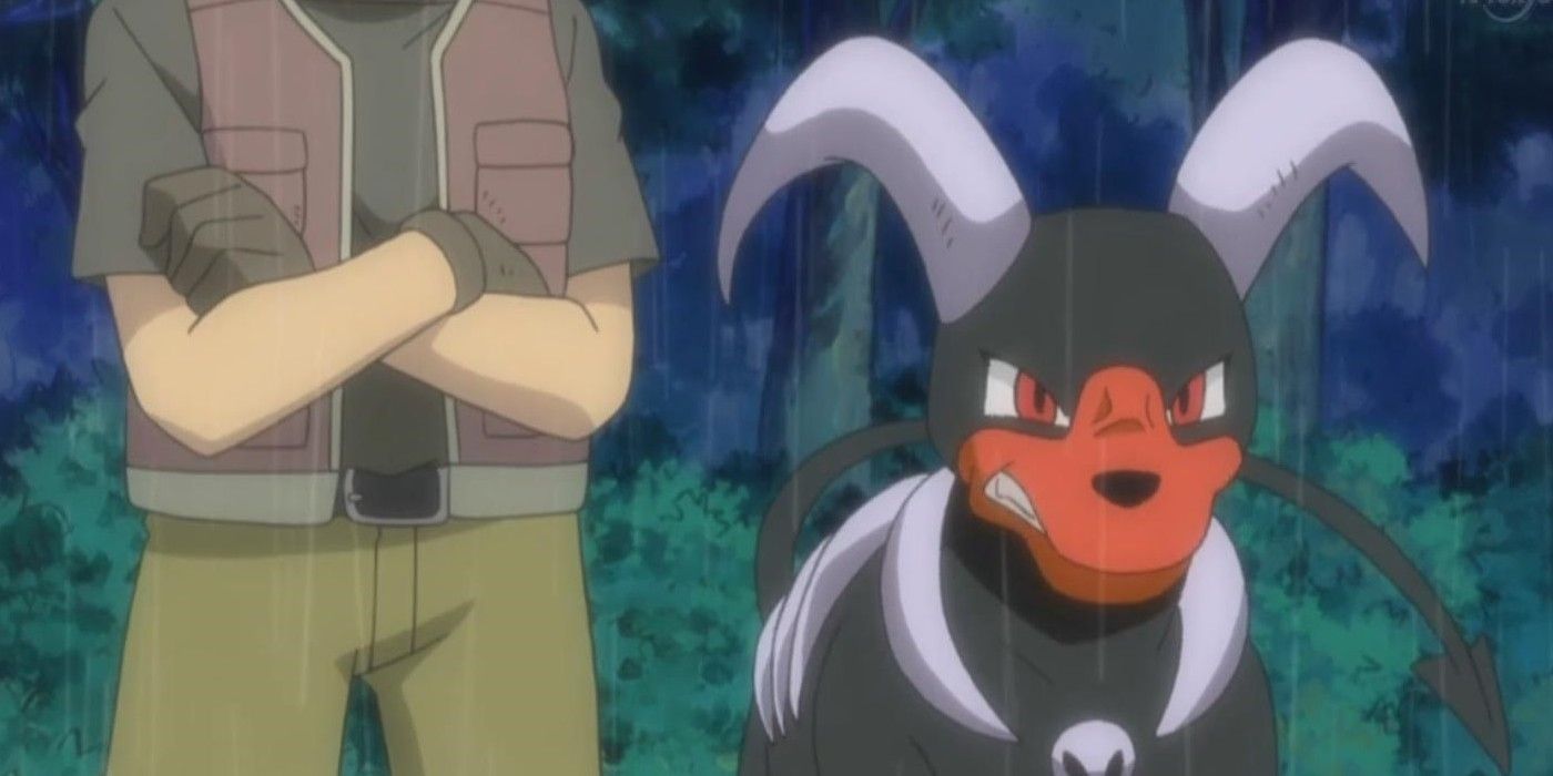 Houndoom growling while standing beside a Trainer in Pokemon