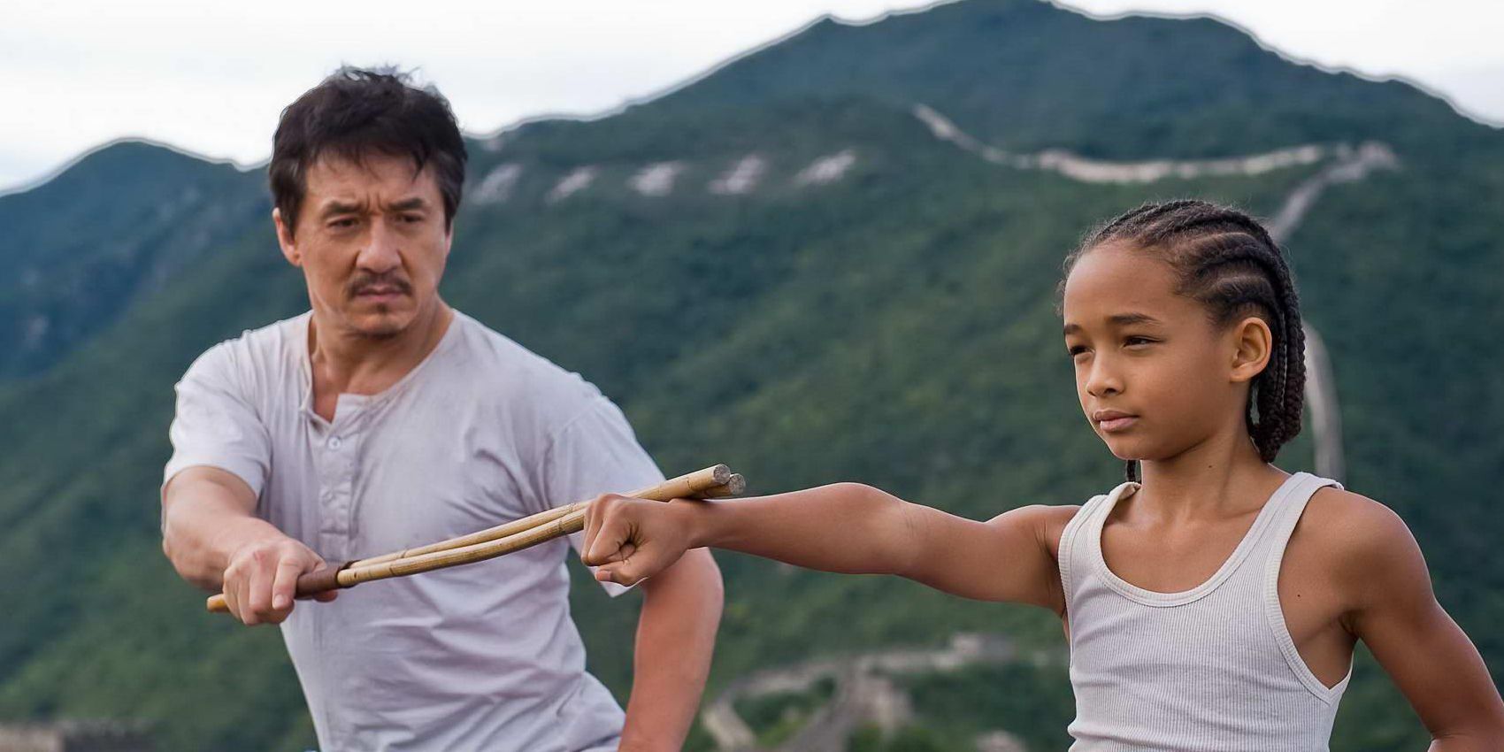 Jackie Chan sebagai Mr. Han dan Jaden Smith sebagai Dre Parker berlatih di Karate Kid 2010