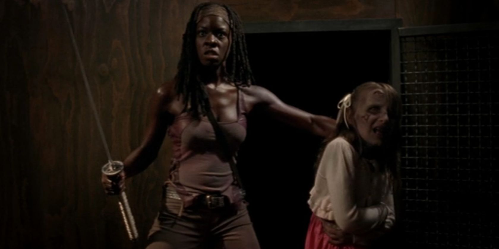 Michonne e a filha do governador em The Walking Dead