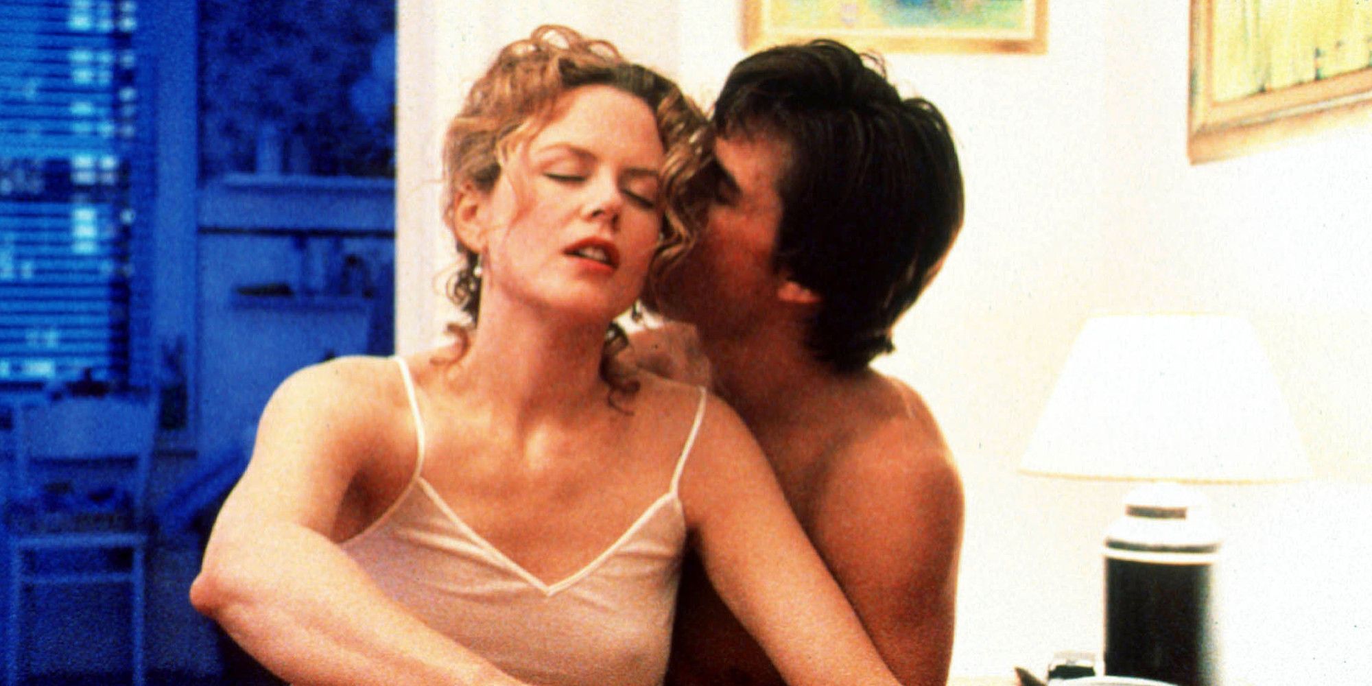 Tom Cruise kisses Nicole Kidman's ear in Eyes Wide Shut
