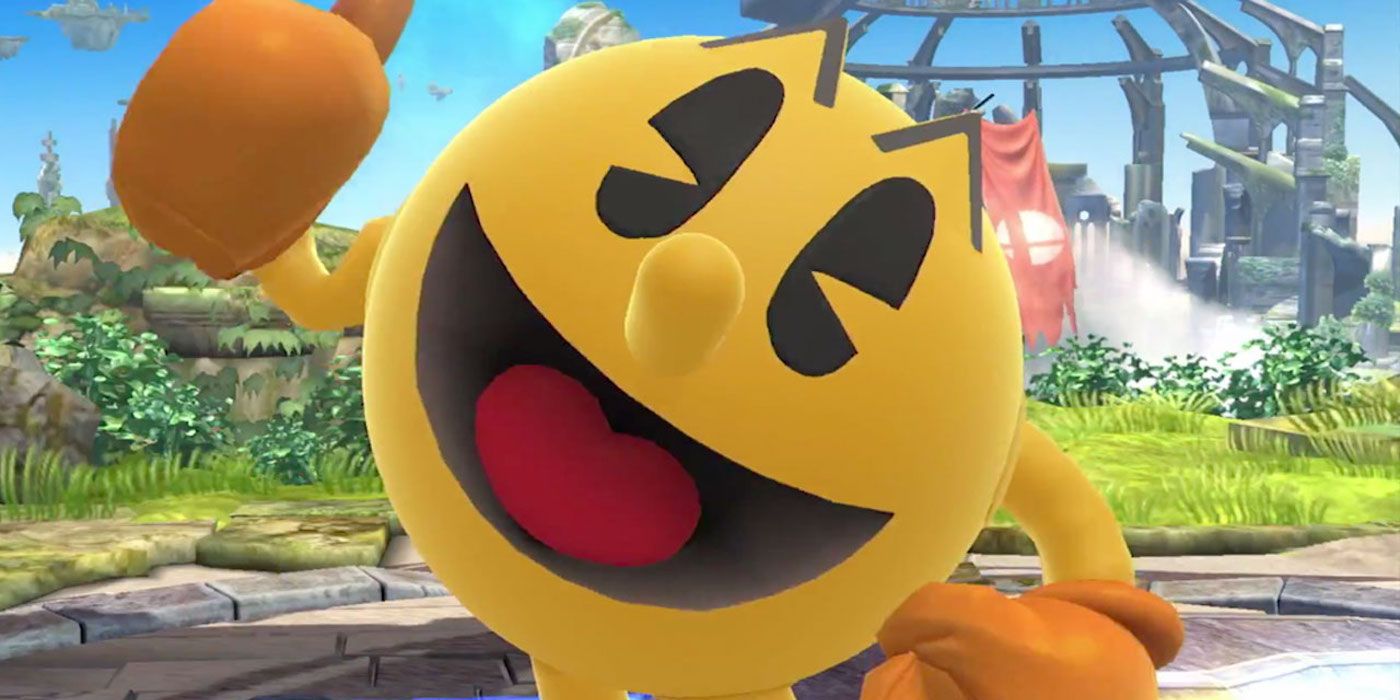 Pac-Man smiling and giving a thumbs up to the camera in Smash Bros.