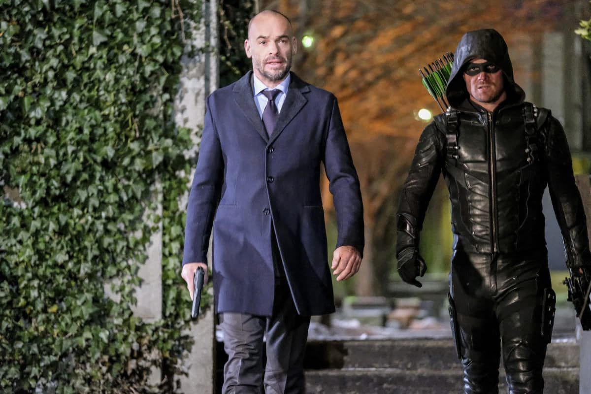 Paul Blackthorne and Stephen Amell in Arrow