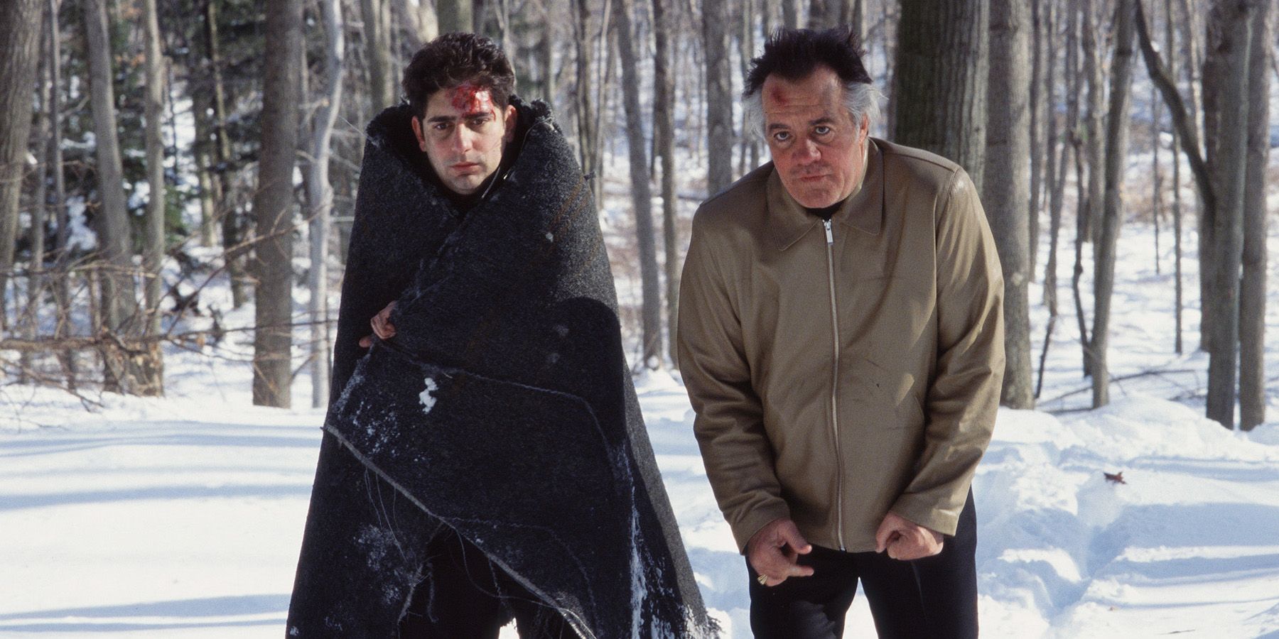 Christopher and Paulie injured in the snowy forest in The Sopranos