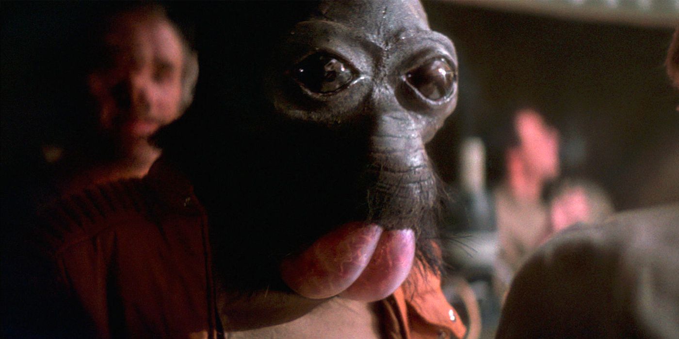 Ponda Baba looks at another creature in Star Wars.
