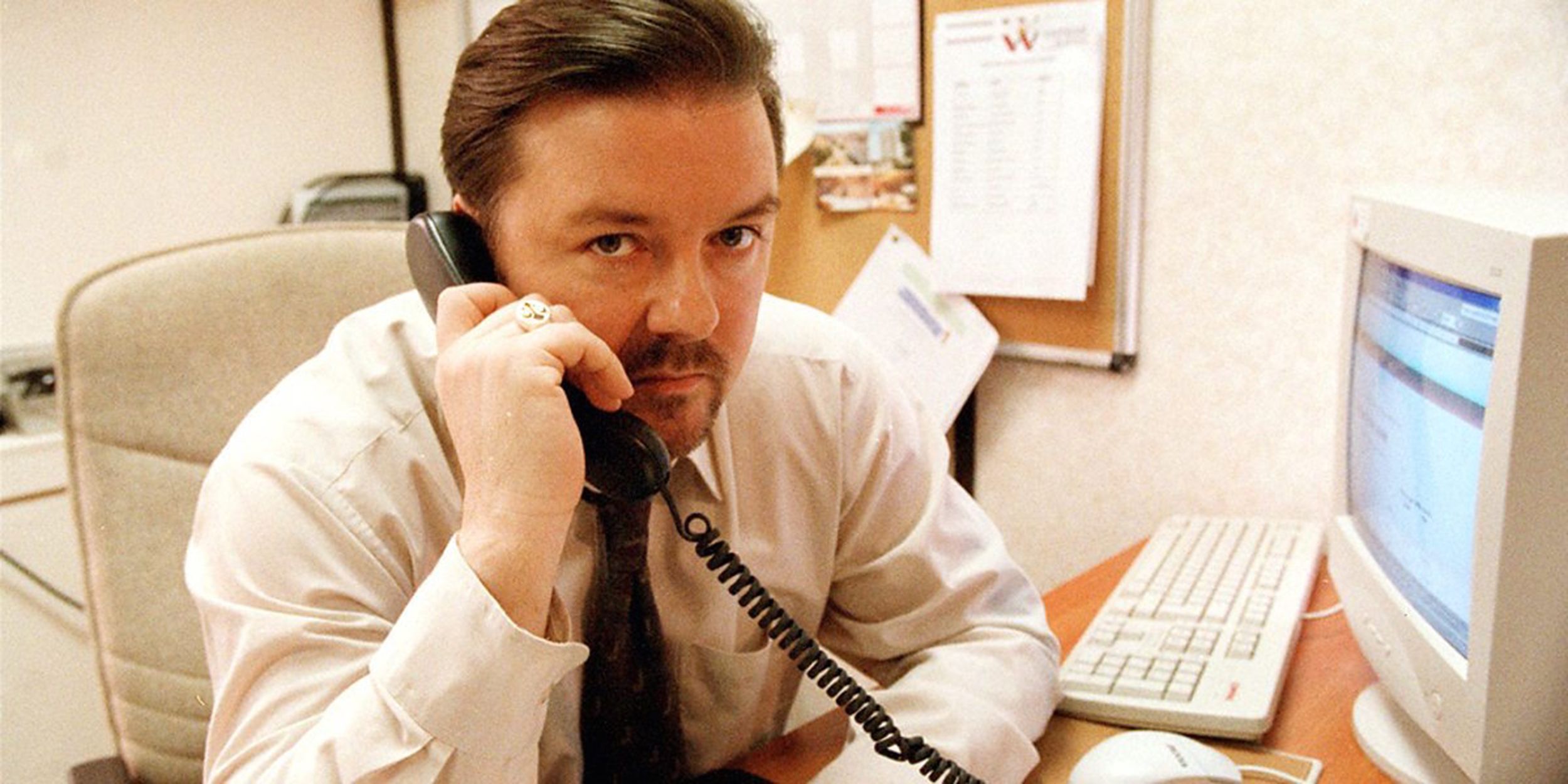 David Brent talking on the pgone in in The Office UK
