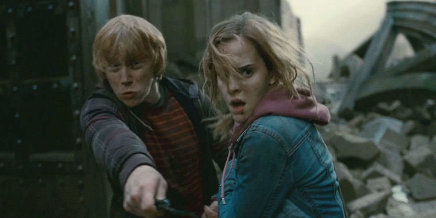 Rupert Grint as Ron Weasley and Emma Watson as Hermione Granger