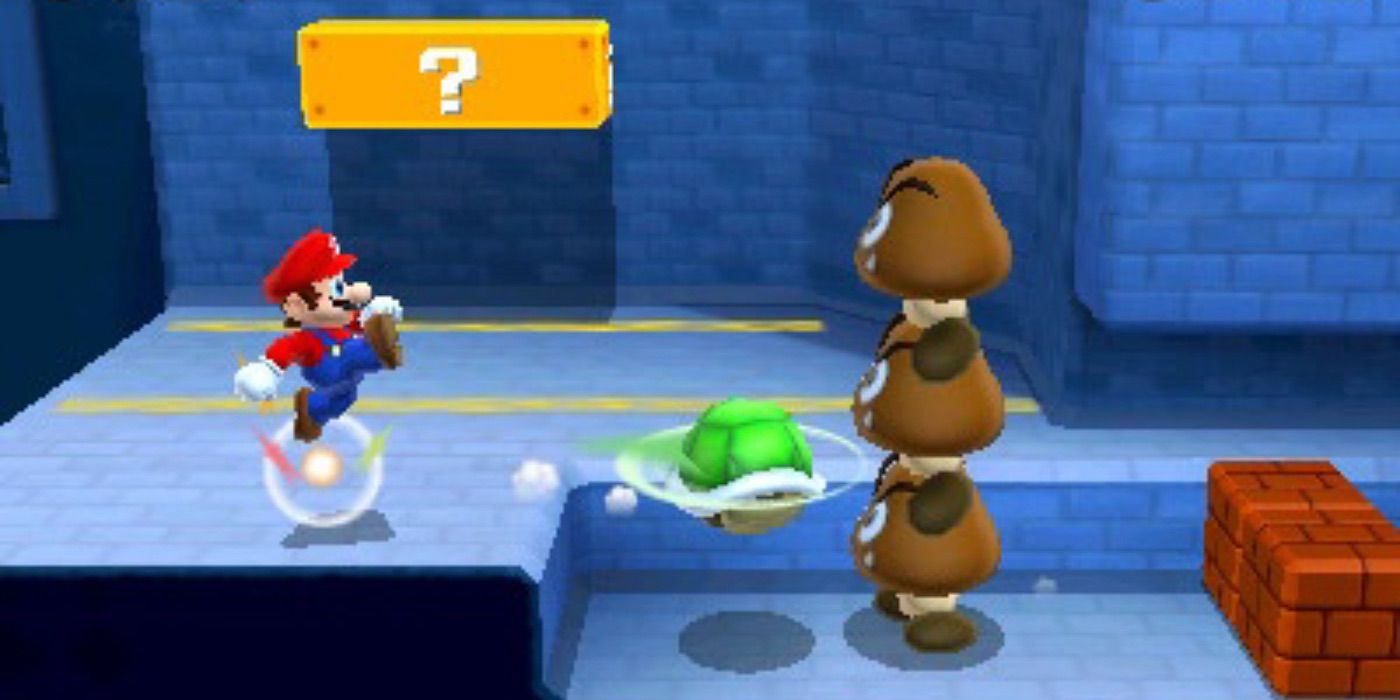 Mario throws a turtle shell at an enemy in Super Mario 3D Land.