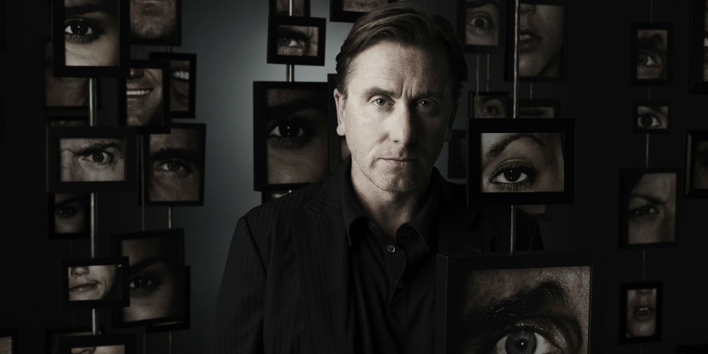 Tim Roth stands in a room full of mirrors in Lie to Me