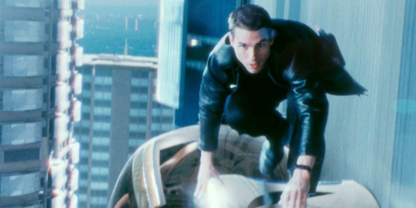 Tom Cruise jumping over an object in Minority Report
