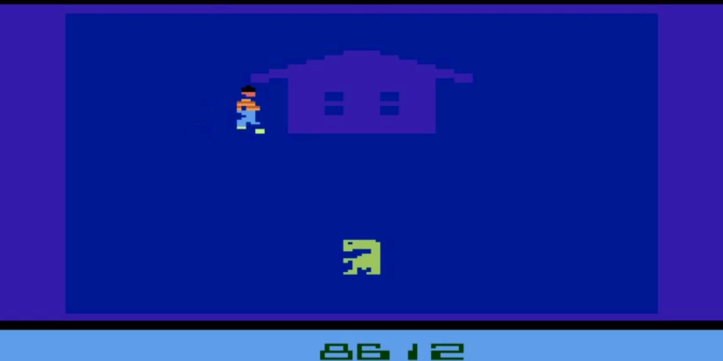 A screenshot of the E.T. video game by Atari, showing a pixellated E.T. against a blue background