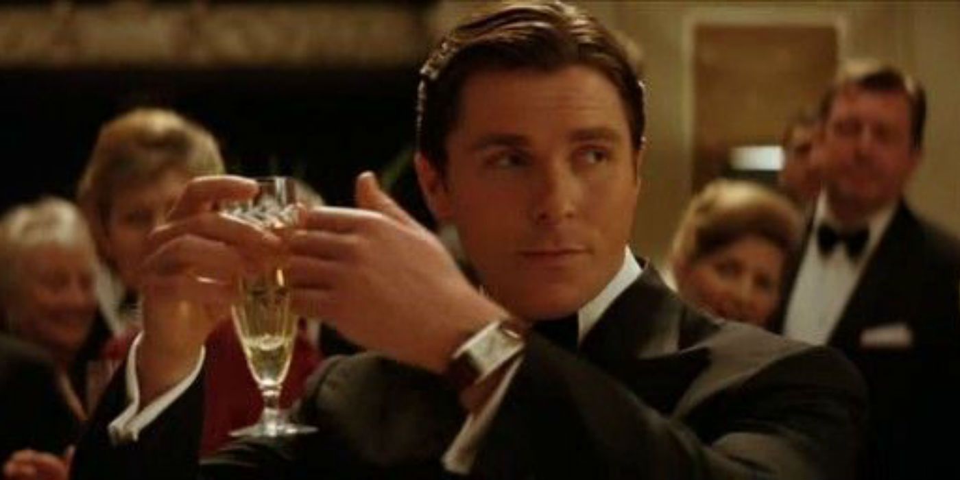 Bruce Wayne making a toast in Batman Begins.