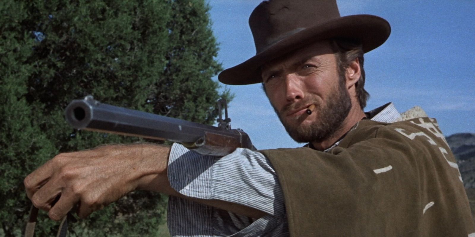 Clint Eastwood holding a rifle in The Good The Bad And The Ugly