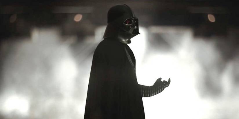 Darth Vader stands in his base surrounded by smoke in Rogue One