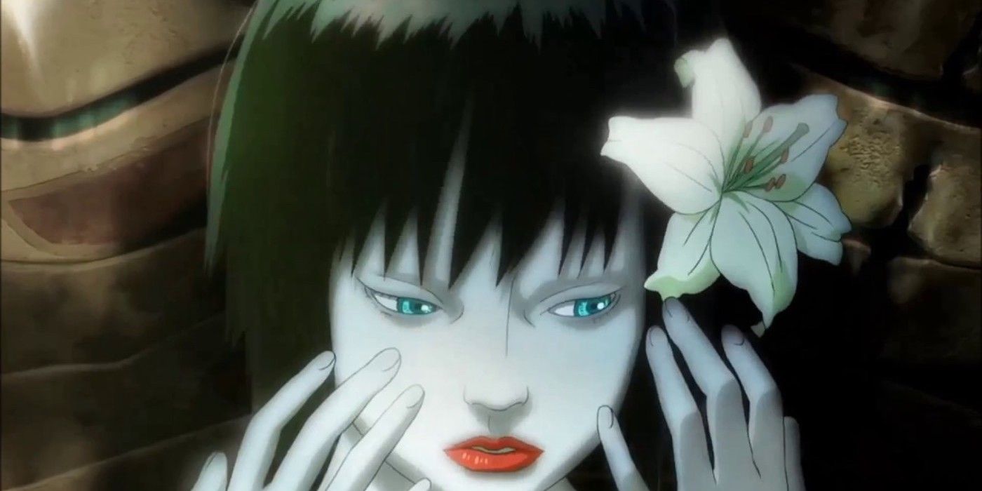 A girl puts her hand to her face in Ghost in the Shell 2 Innocence