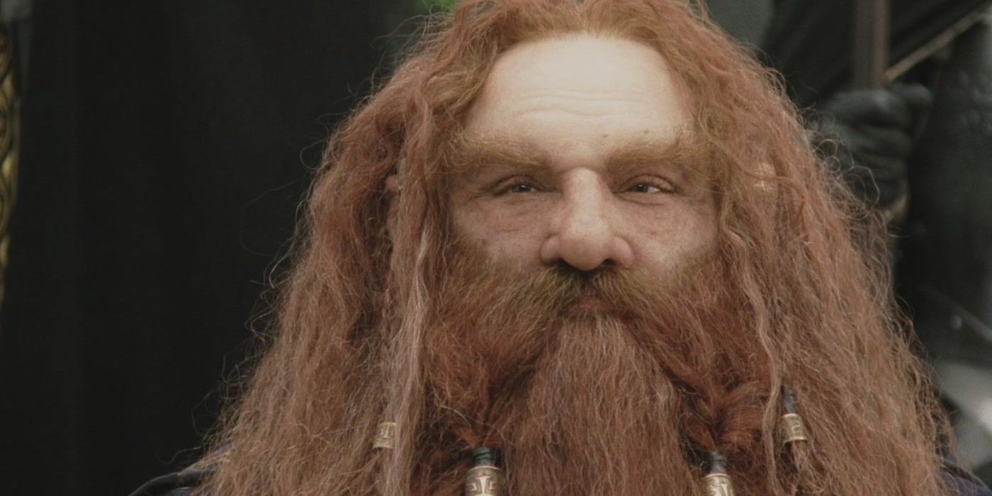 Gimli smiles without his helmet on in Lord of the Rings 