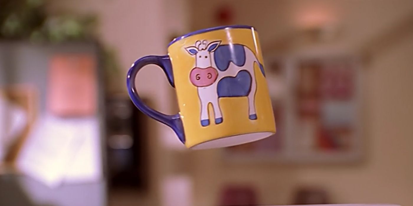 Invisible Buffy Messing with a Cow Mug