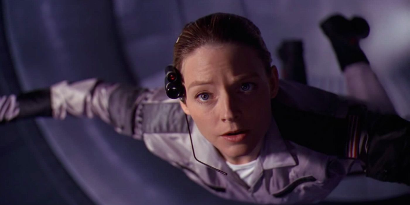 Jodie Foster looking at something offscreen as she float in a ship in Contact.