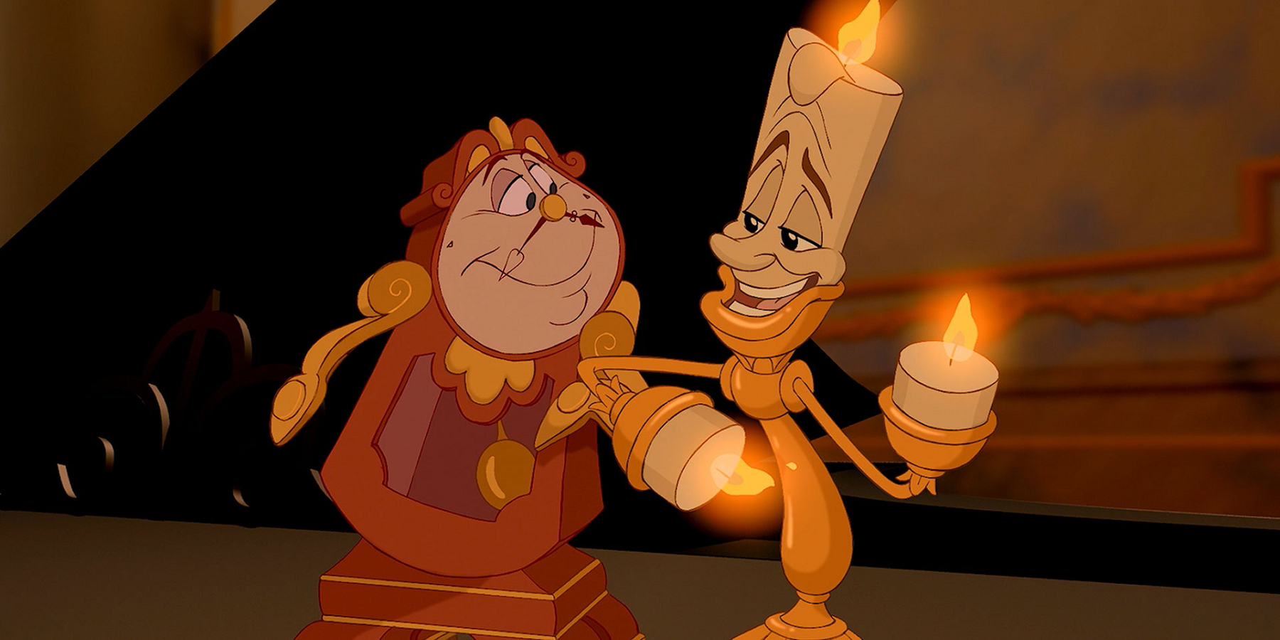 Lumiere and Cogsworth in Beauty and the Beast