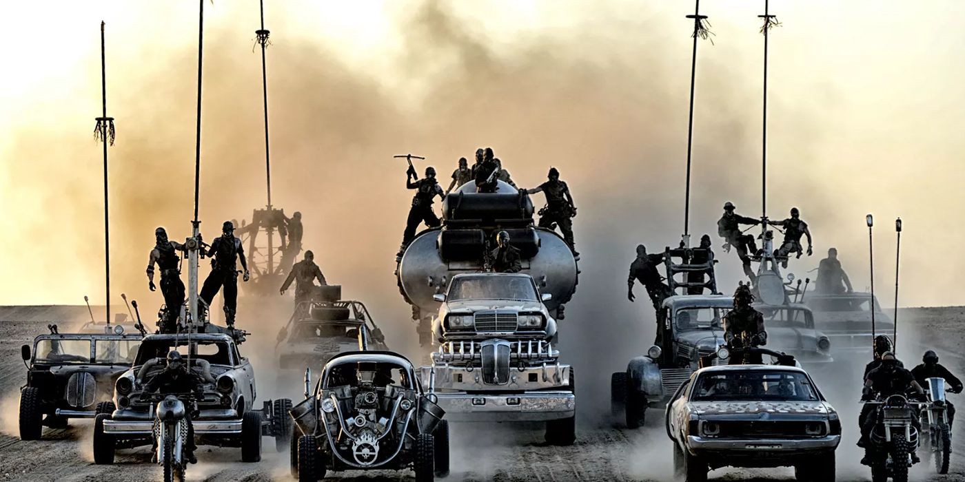 A convoy of vehicles drives through the desert from Mad Max Fury Road