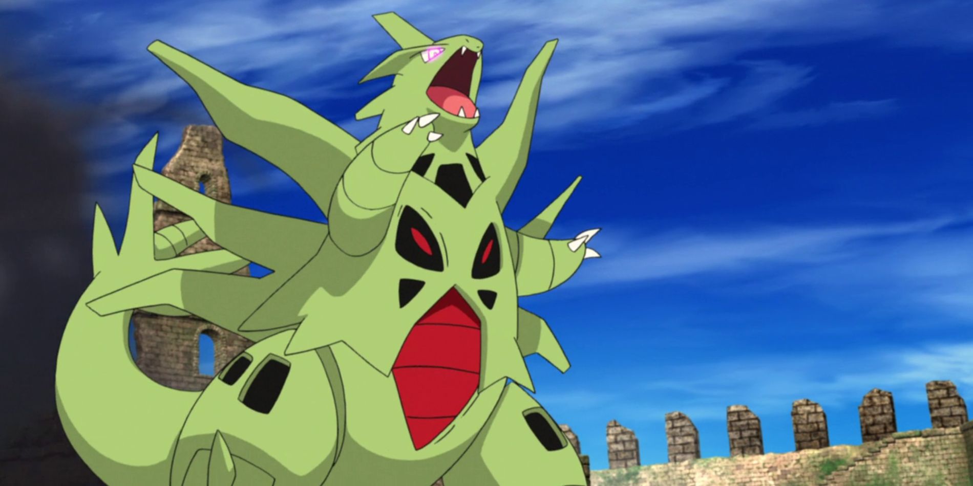 Mega Tyranitar roars and prepares to attack in the Pokemon anime