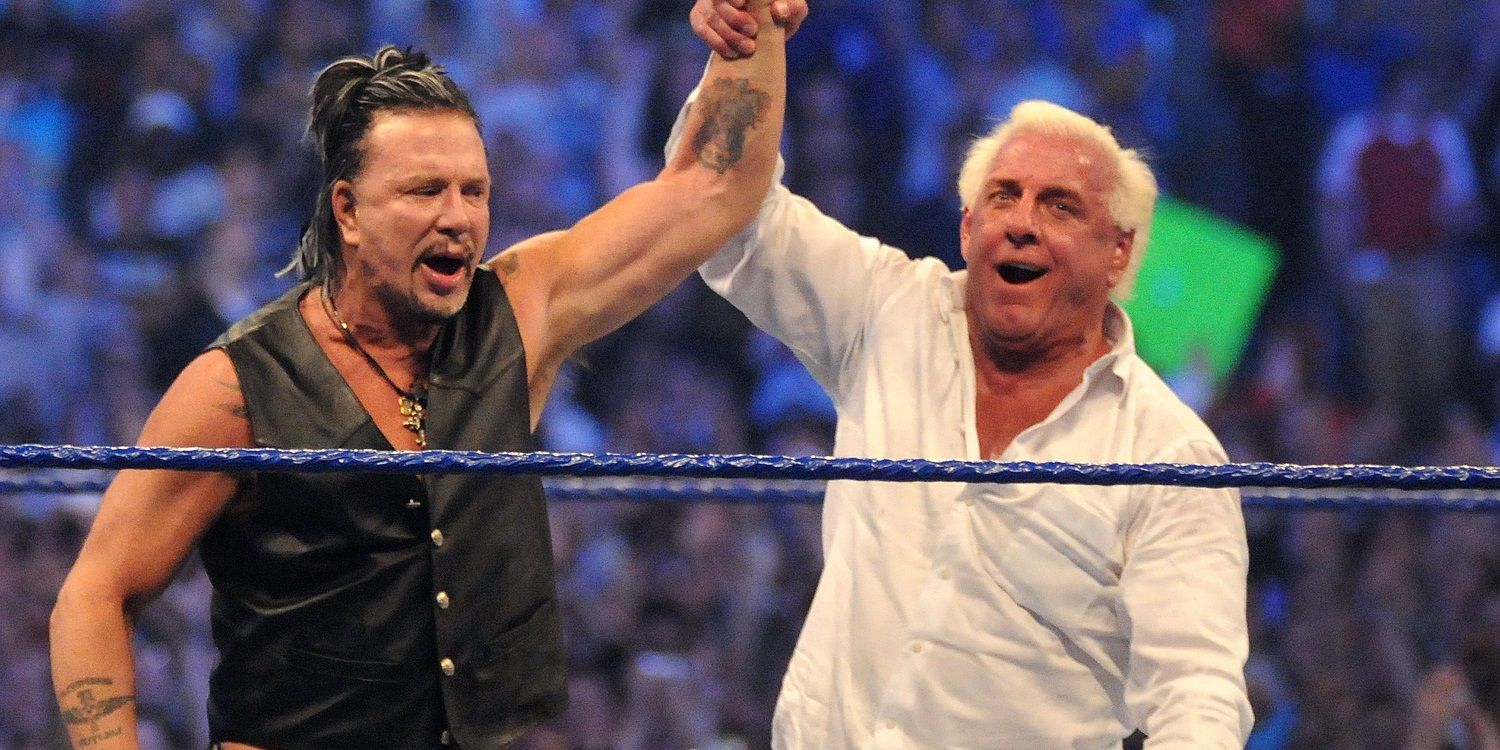 Mickey Rourke getting his hand raised by Ric Flair at Wrestlemania XXV after knocking out Chris Jericho