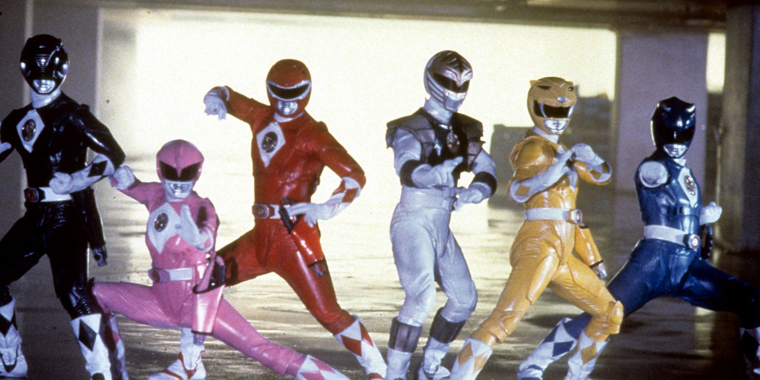The Mighty Morphin Power Rangers pose as a team