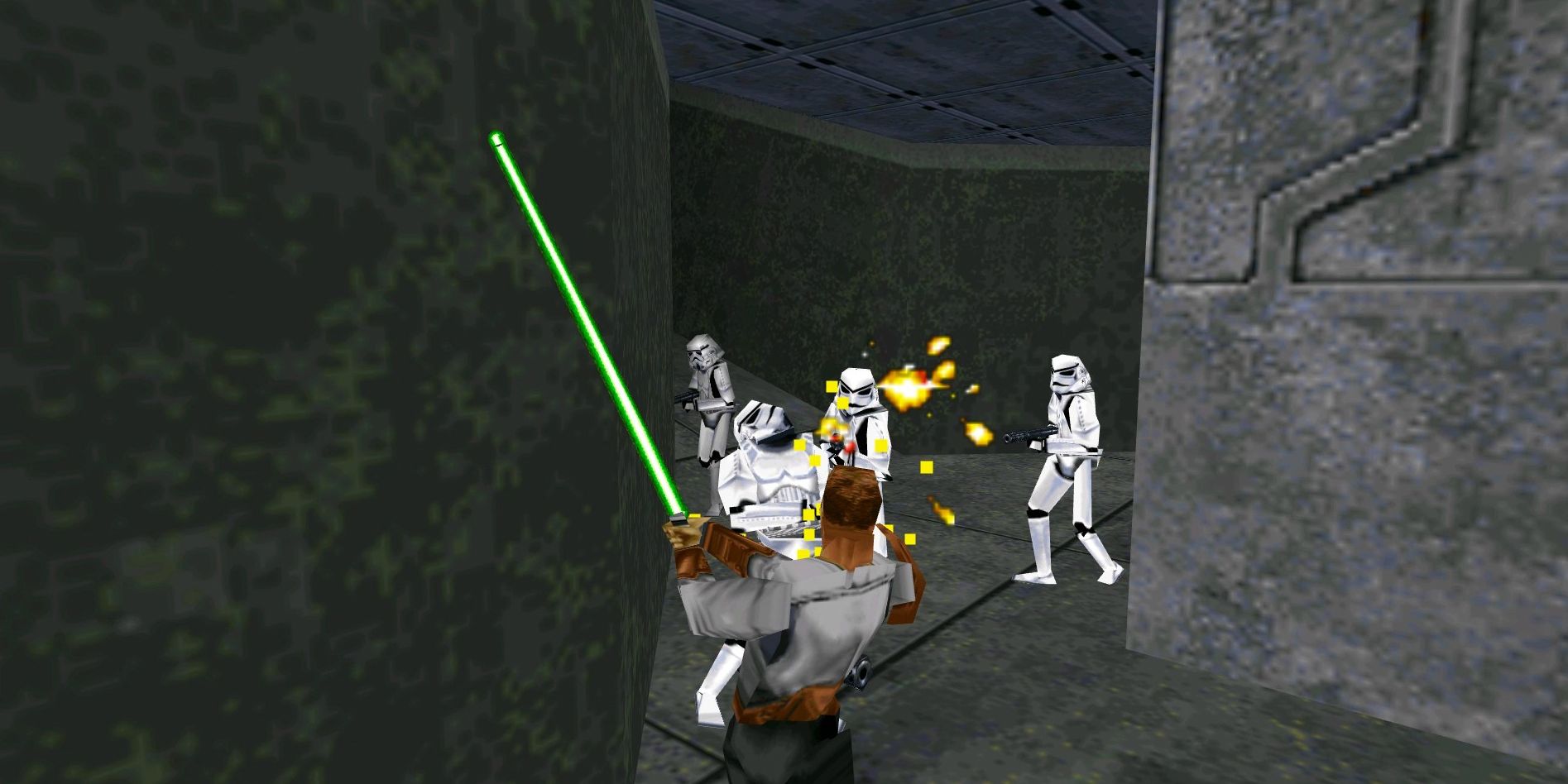 Kyle Katarn fighting stormtrooopers with a green lightsaber in Star Wars Jedi Knight Dark Forces 2.