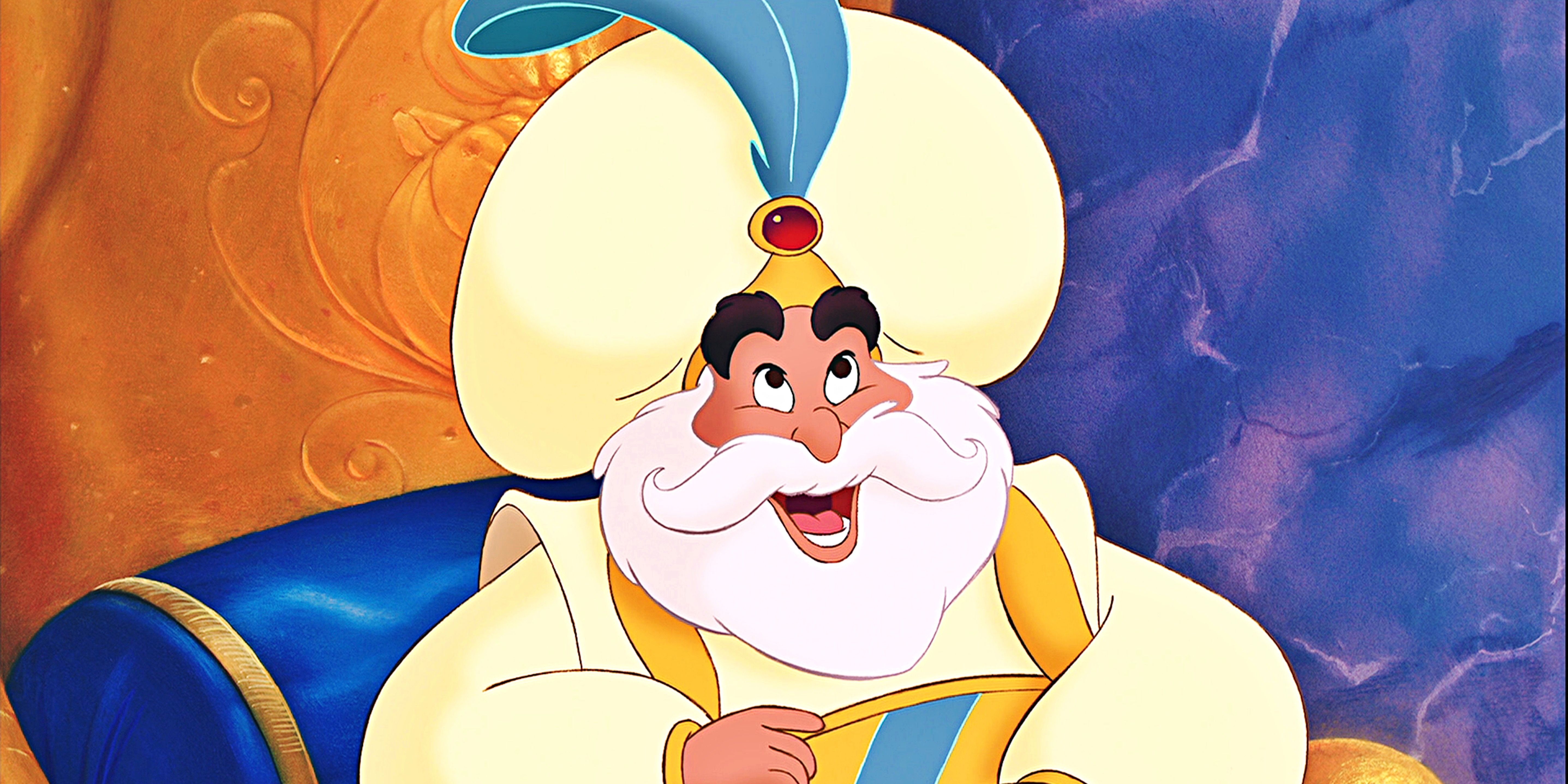 Sultan from Aladdin smiling
