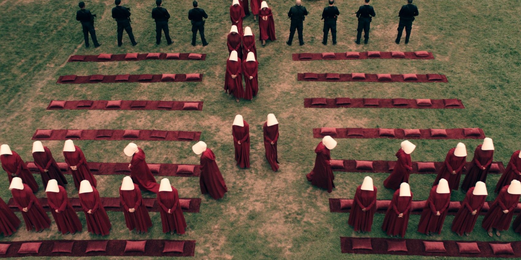 A crowd of handmaids in The Handmaid's Tale 